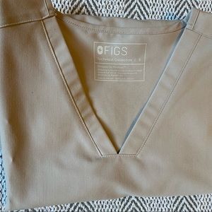 Figs two pocket scrub top. Never worn! Limited color release!